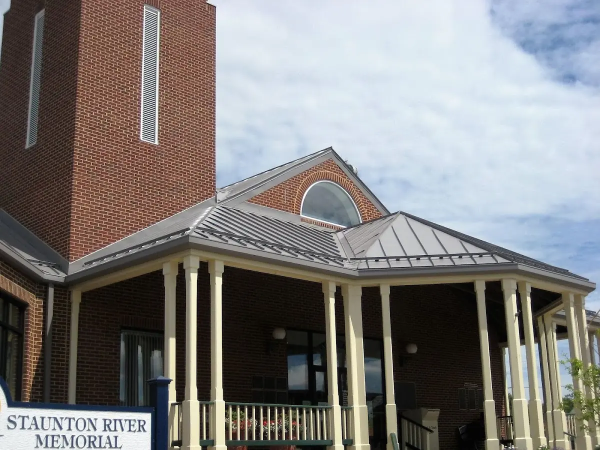 Skilled roofing craftsmen working on a residential roof in Linwood